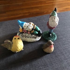 4 mini garden statues.